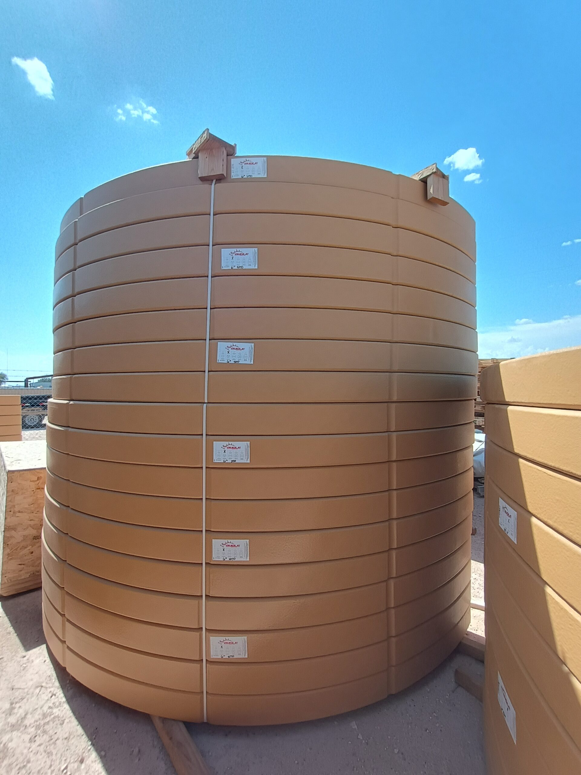 Secondary Containment in Midland - TX surrounding storage equipment on an active industrial yard