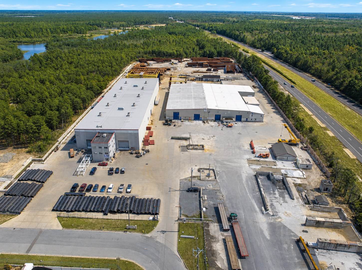 Additional Services in Midland - TX underway as a crew organizes materials and prepares an active industrial site